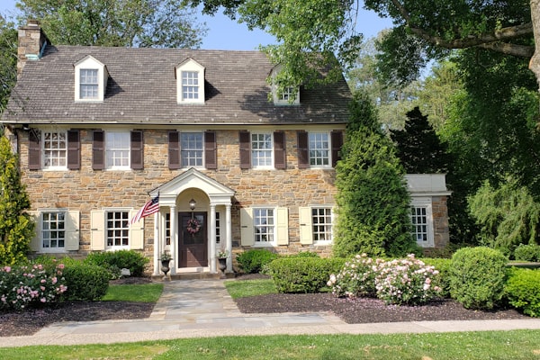 Beautiful residential home with stone facade and landscaping in Charlotte, NC
