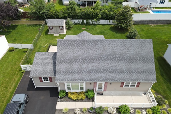 Aerial view of residential home with new roof in Charlotte NC