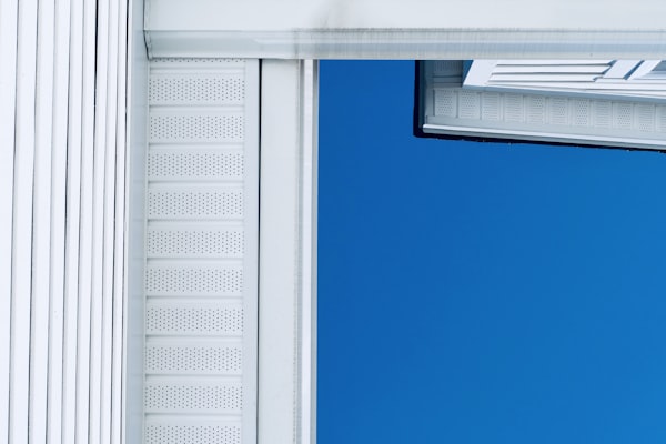 White vinyl siding on residential home exterior